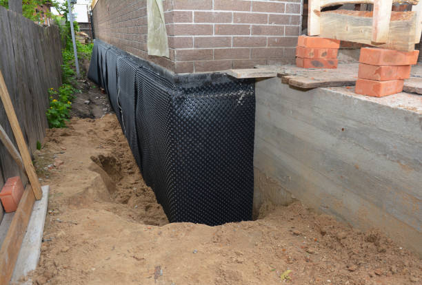 Happy homeowners after waterproofing job in Waynesboro